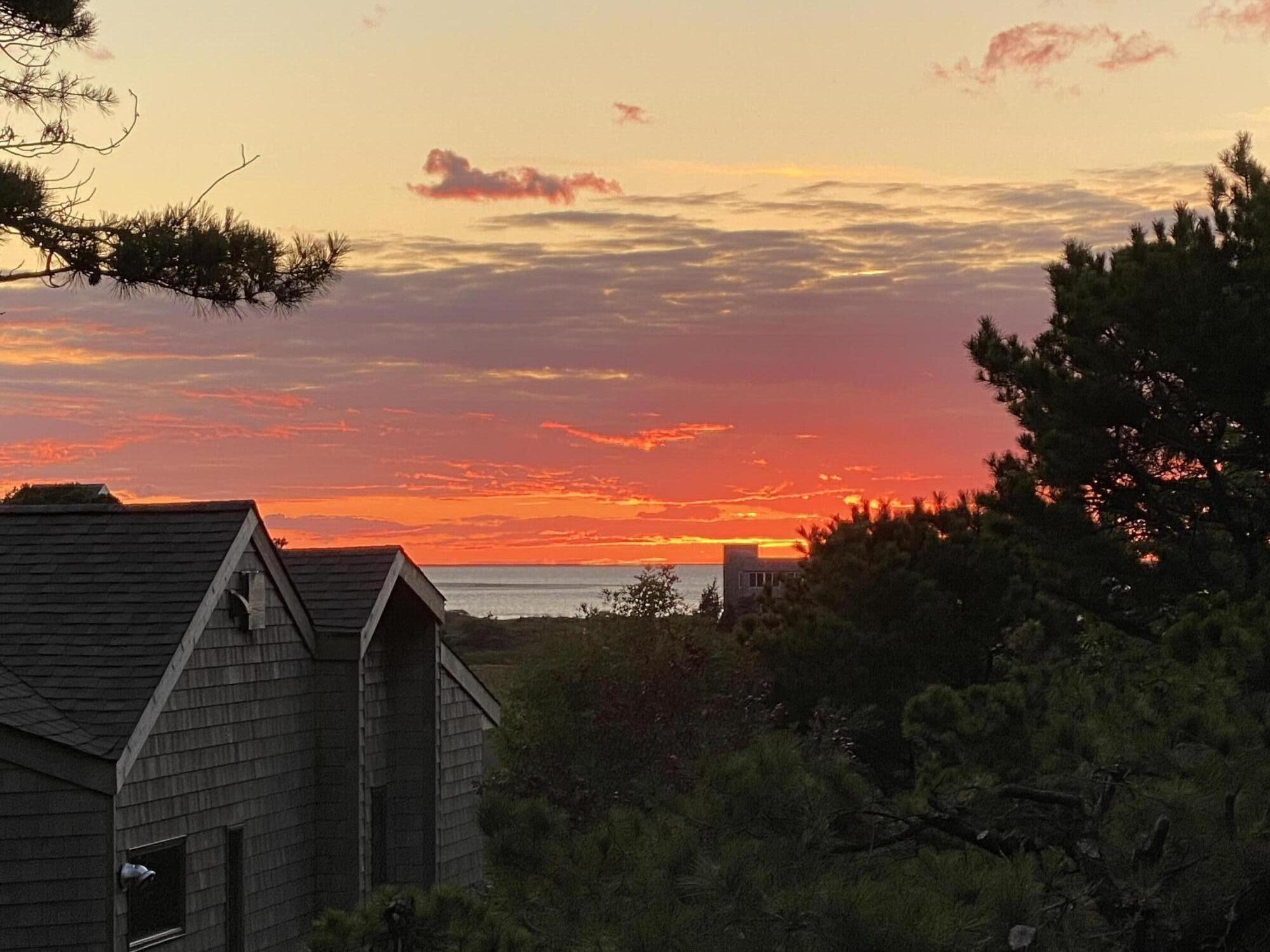 55 Lookout Road Wellfleet, MA 02667 - Photo 4 of 13 a view of an ocean and a mountain
