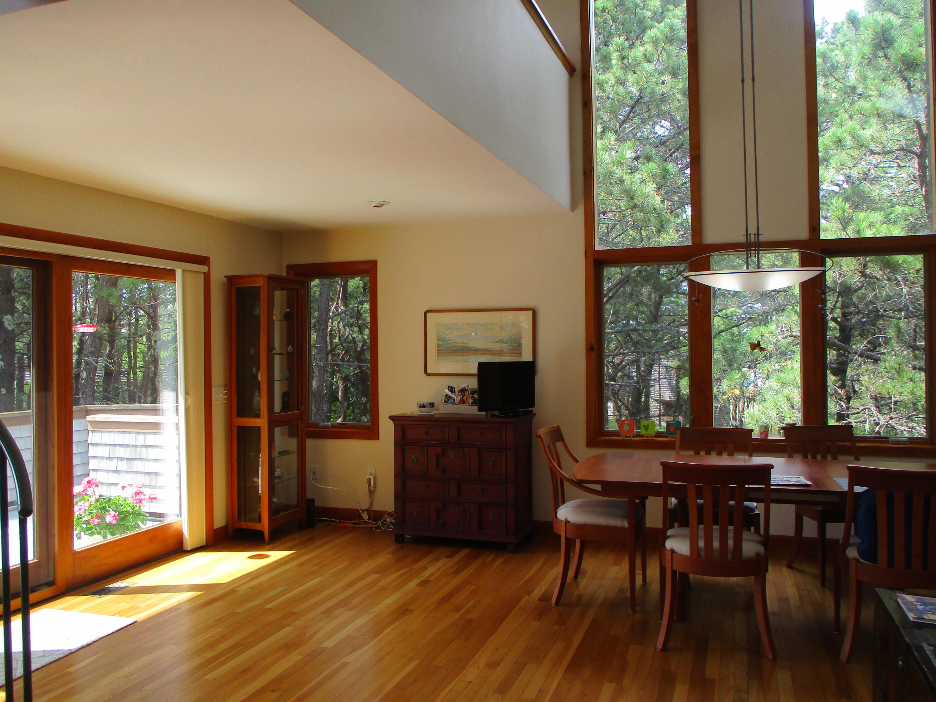 55 Lookout Road Wellfleet, MA 02667 - Photo 6 of 13 a view of a dining room with furniture and windows