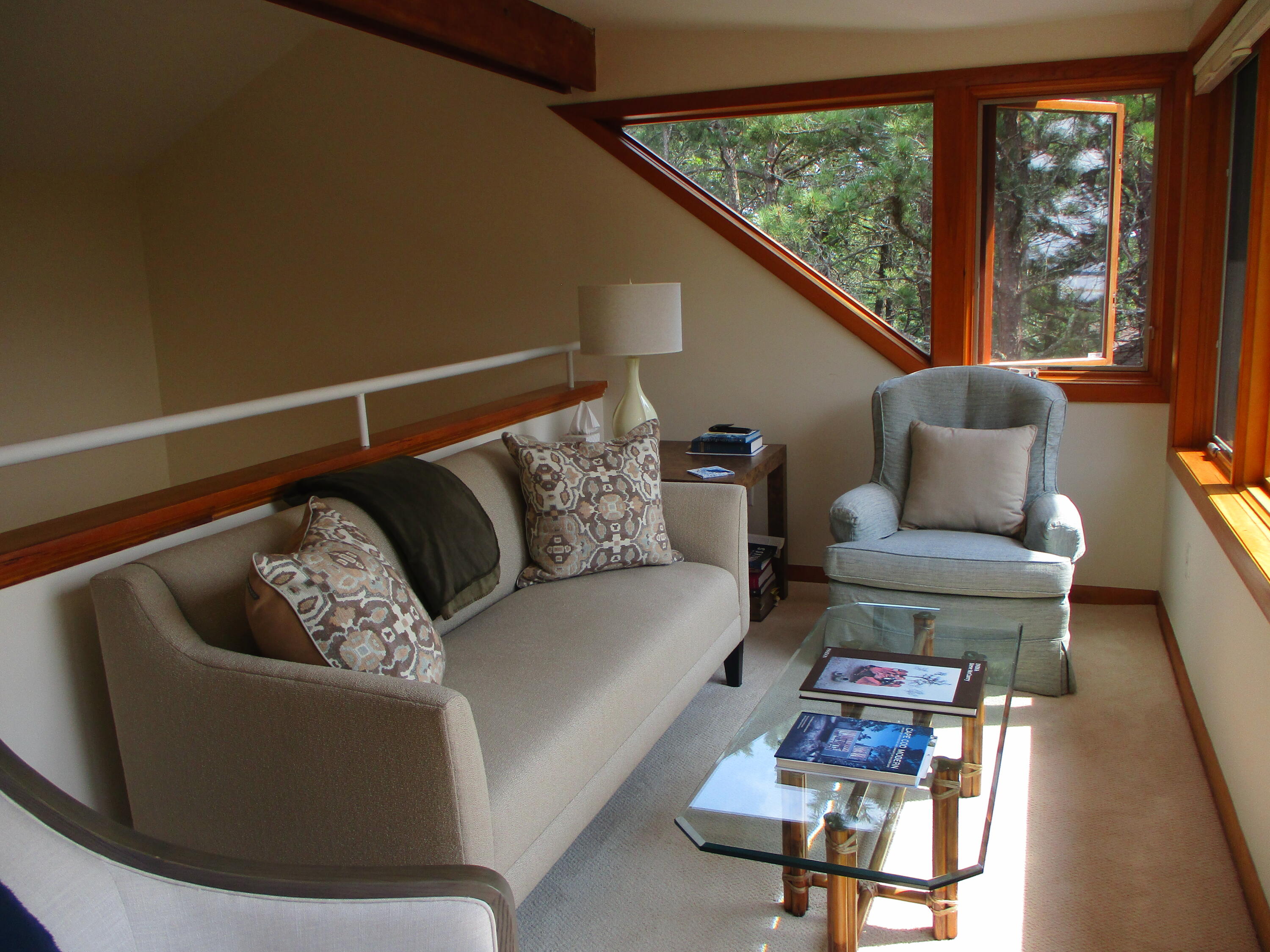55 Lookout Road Wellfleet, MA 02667 - Photo 9 of 13 a living room with furniture and a floor to ceiling window