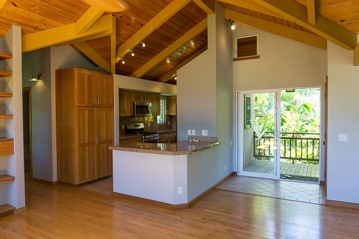 47 Door Of Faith Road Haiku, HI 96708 - Photo 16 of 30 a view of living room with stainless steel appliances wooden floor and windows