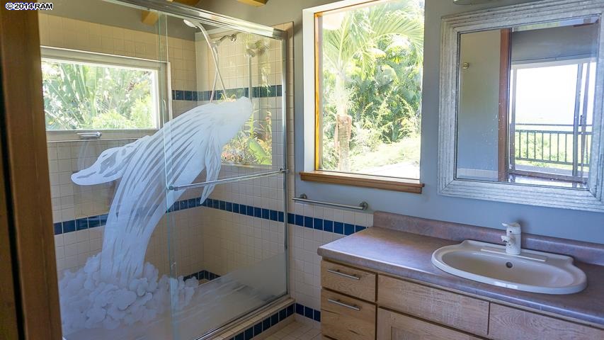 47 Door Of Faith Road Haiku, HI 96708 - Photo 25 of 30 a bathroom with a sink and a mirror