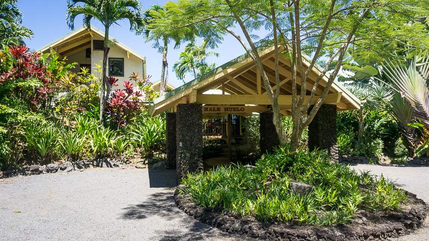 47 Door Of Faith Road Haiku, HI 96708 - Photo 29 of 30 a front view of a house with a yard and potted plants