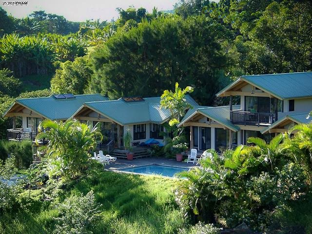 47 Door Of Faith Road Haiku, HI 96708 - Photo 3 of 30 a front view of a house with garden
