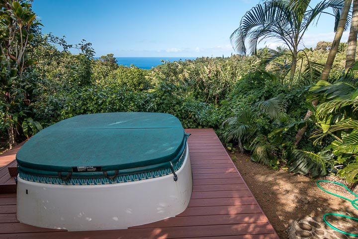 47 Door Of Faith Road Haiku, HI 96708 - Photo 7 of 30 a view of a swimming pool with a balcony