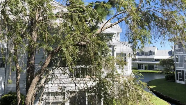 a front view of a house with swimming pool