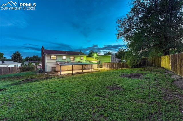 7108 Chippewa Road Colorado Springs, CO 80915 - Photo 8 of 40 Large backyard with covered patio!
