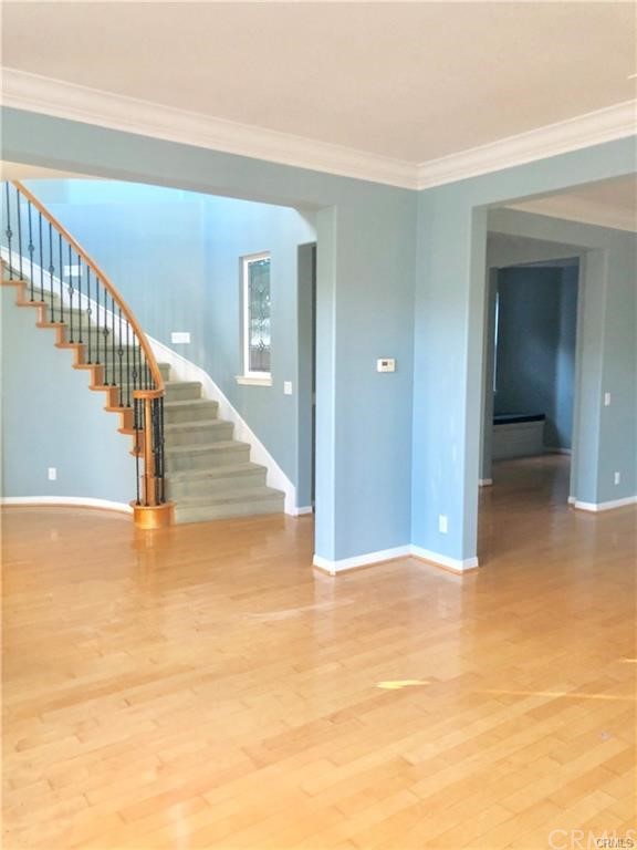 5 Modesto Irvine, CA 92602 - Photo 6 of 22 Grand foyer entrance which leads into formal dining.