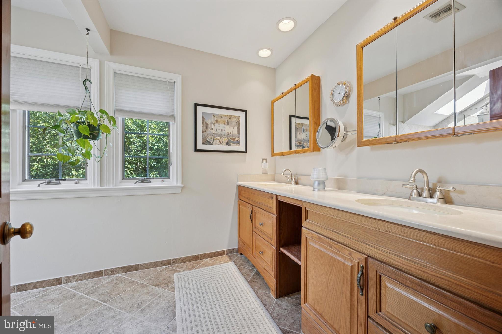 773 Beatty View Road Springfield, PA 19064 - Photo 33 of 66 En suite with Double sink vanity & tiled floors