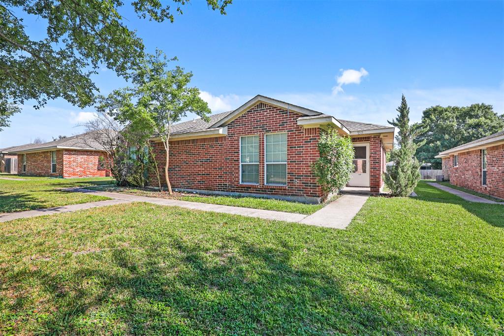 919 Potomac Drive Lancaster, TX 75134 - Photo 1 of 1 a front view of a house with a yard and garage