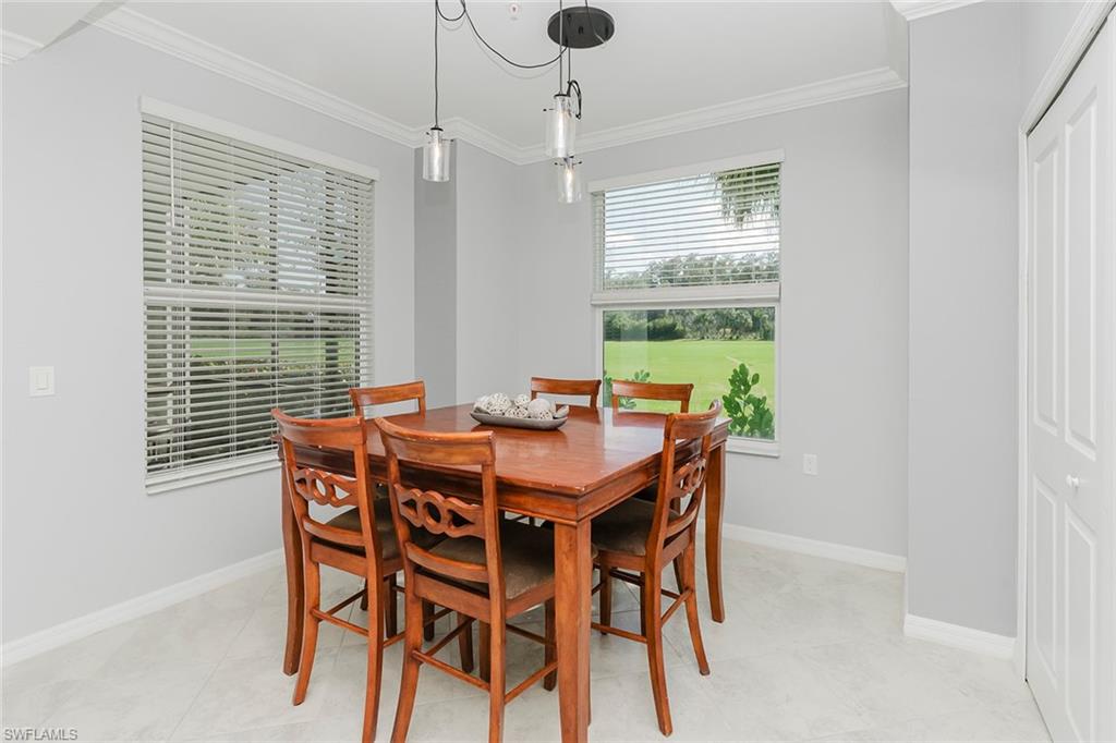 6082 National Blvd Avenue, Unit 115 Immokalee, FL 34142 - Photo 14 of 50 a view of a dining room with furniture window and outside view