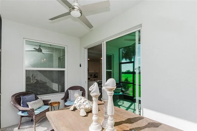 a view of a lake with outdoor seating