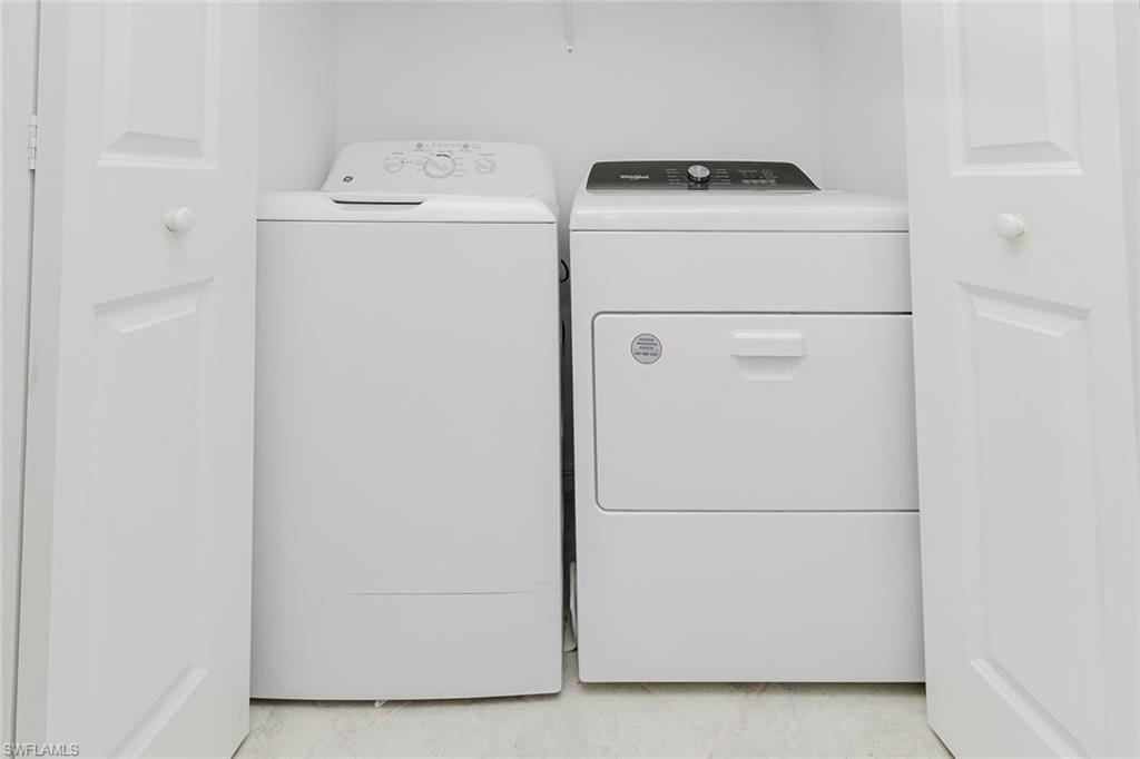 6082 National Blvd Avenue, Unit 115 Immokalee, FL 34142 - Photo 28 of 50 a utility room with dryer and washer