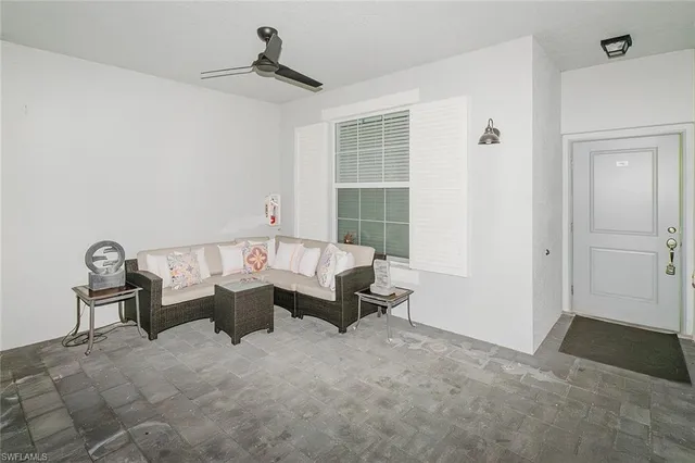 a kitchen with stainless steel appliances a stove microwave and sink