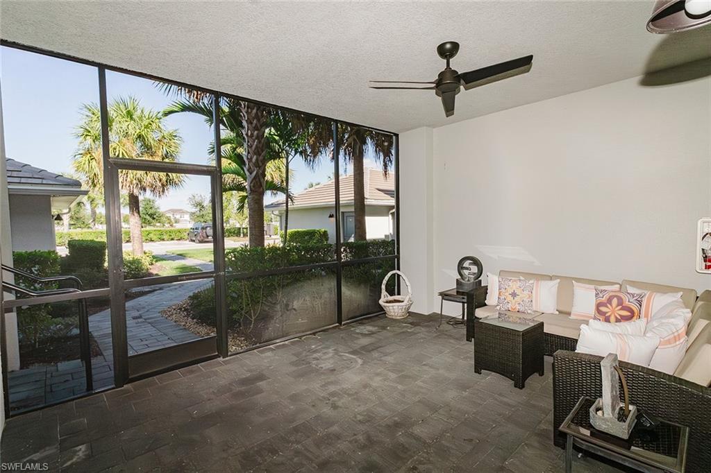 6082 National Blvd Avenue, Unit 115 Immokalee, FL 34142 - Photo 6 of 50 a living room with furniture and a window