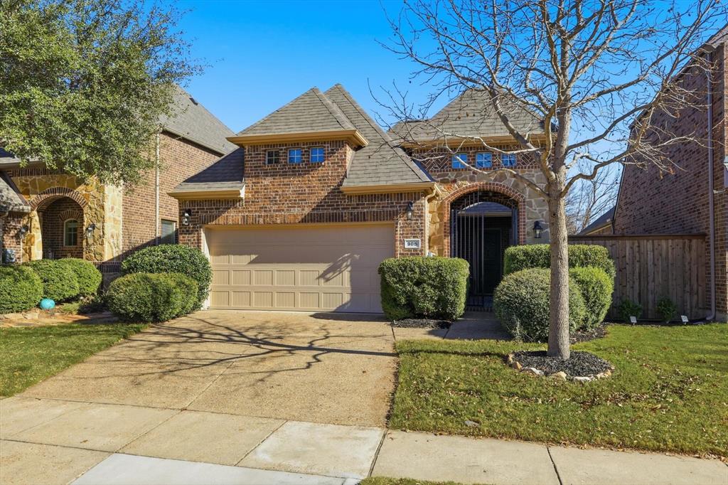 905 Deer Ridge Trail McKinney, TX 75072 - Photo 1 of 1 a front view of a house with garden