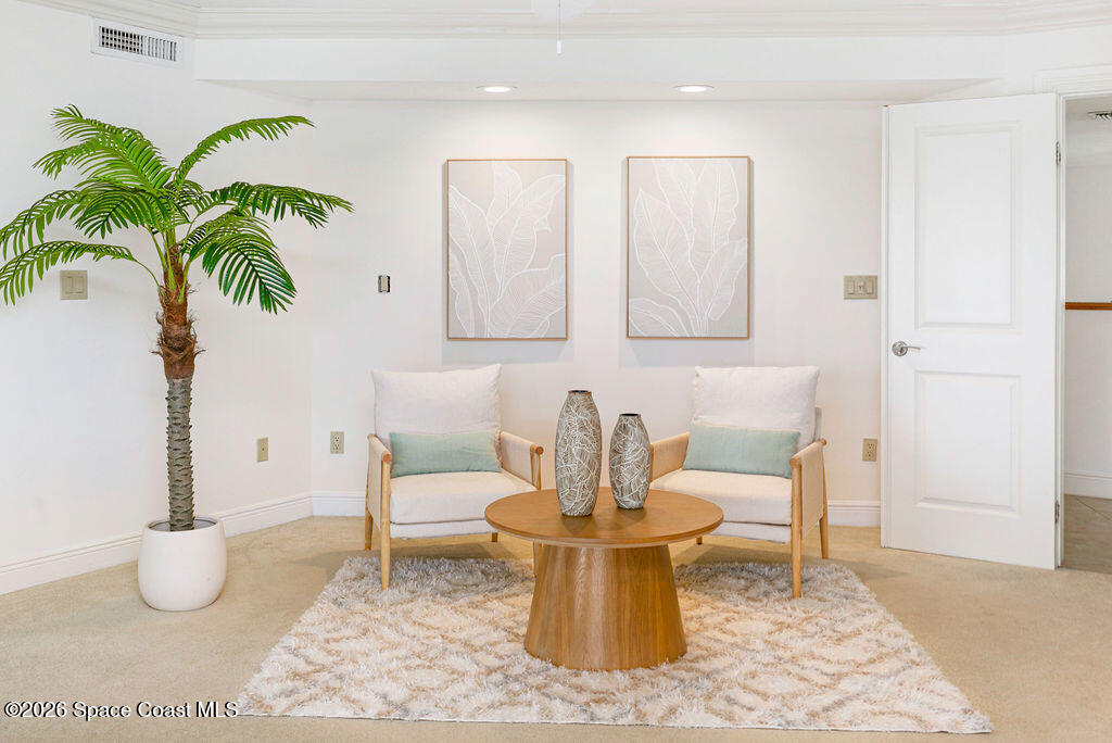 110 Barnacle Place Rockledge, FL 32955 - Photo 26 of 71 a living room with furniture and a potted plant