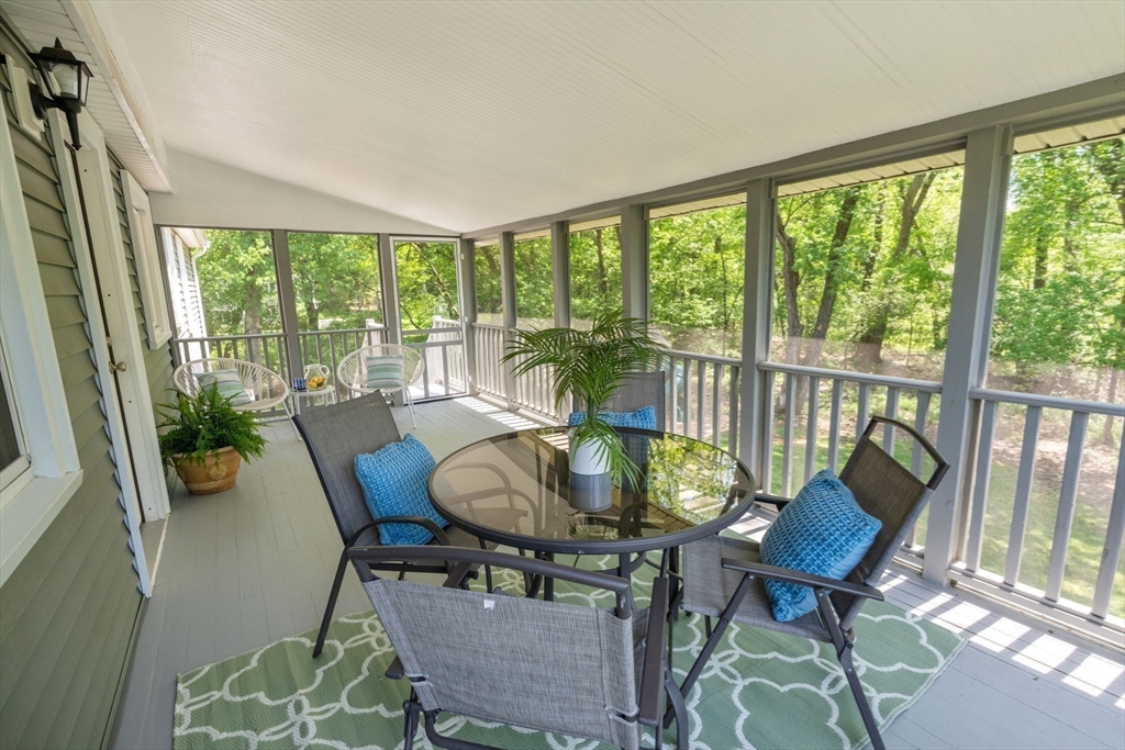 11 Longmeadow Road Medfield, MA 02052 - Photo 25 of 39 a view of a dining room with furniture window and outside view