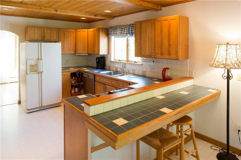 173 Upper Dedham Road Holden, ME 04429 - Photo 8 of 35 Kitchen with T&G pine ceiling