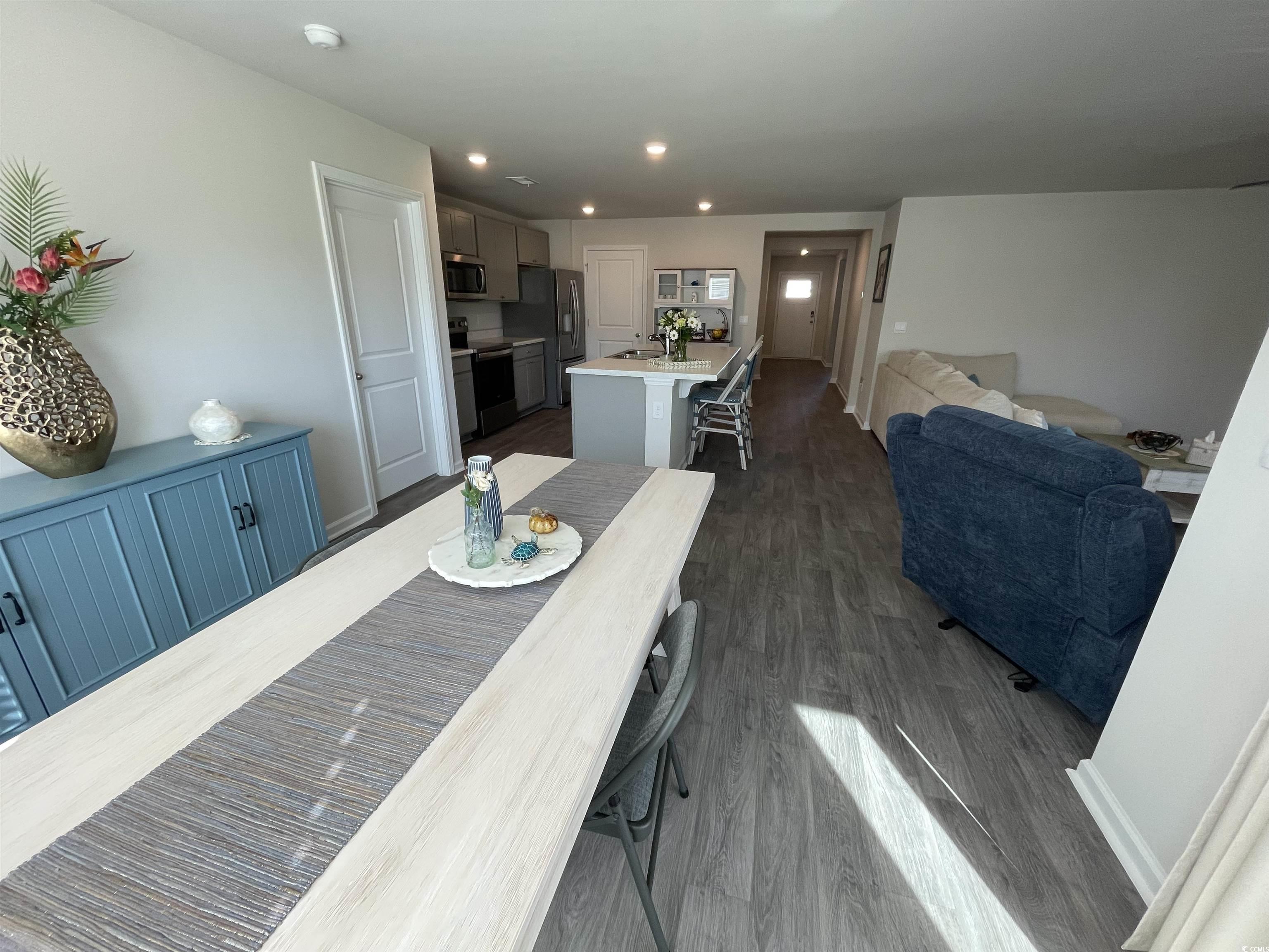 351 Jeff Waters Circle Longs, SC 29568 - Photo 12 of 33 Dining space featuring dark wood-style flooring and recessed lighting
