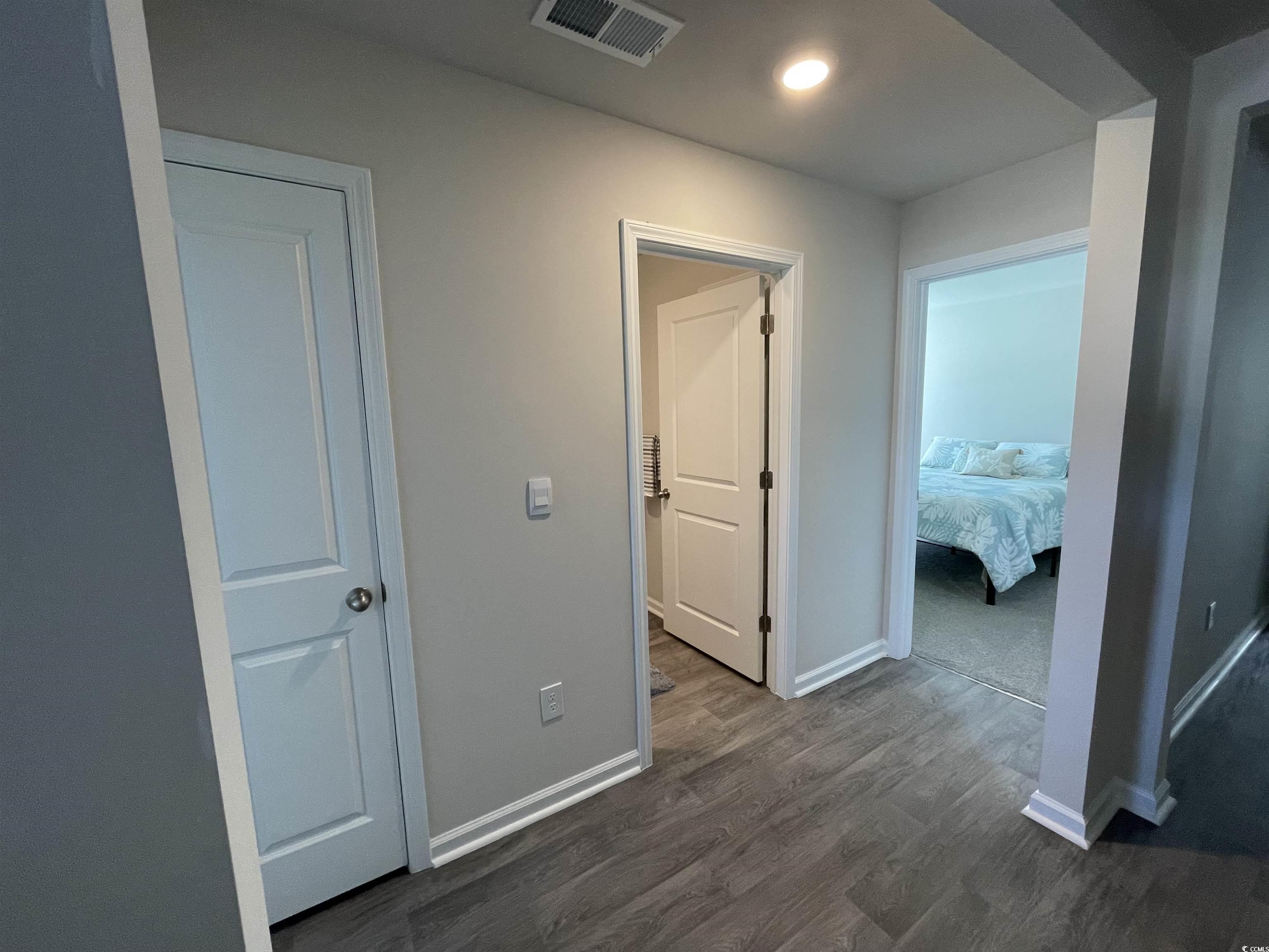 351 Jeff Waters Circle Longs, SC 29568 - Photo 20 of 33 Hallway featuring dark wood finished floors and recessed lighting