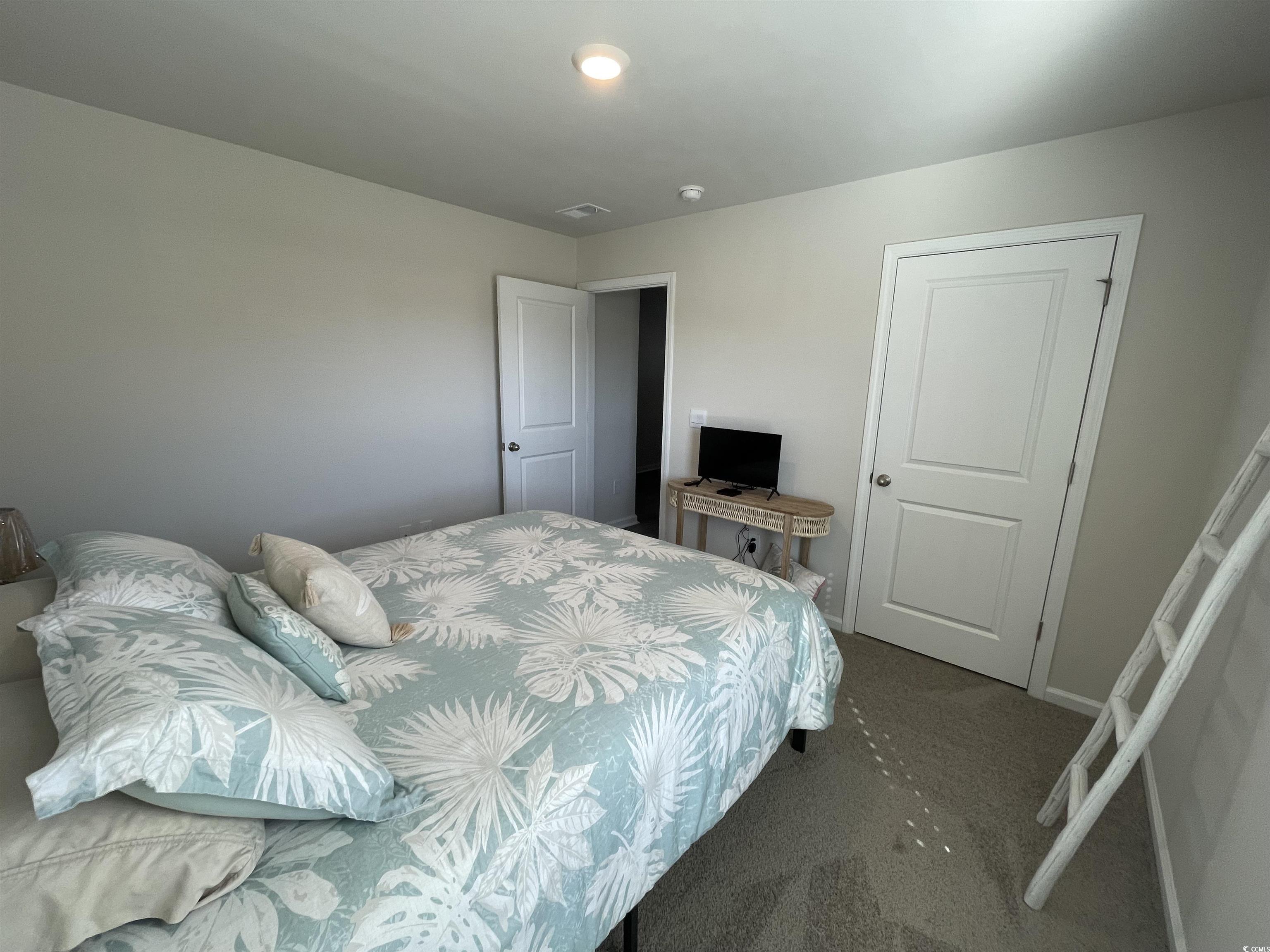 351 Jeff Waters Circle Longs, SC 29568 - Photo 25 of 33 Carpeted bedroom featuring baseboards