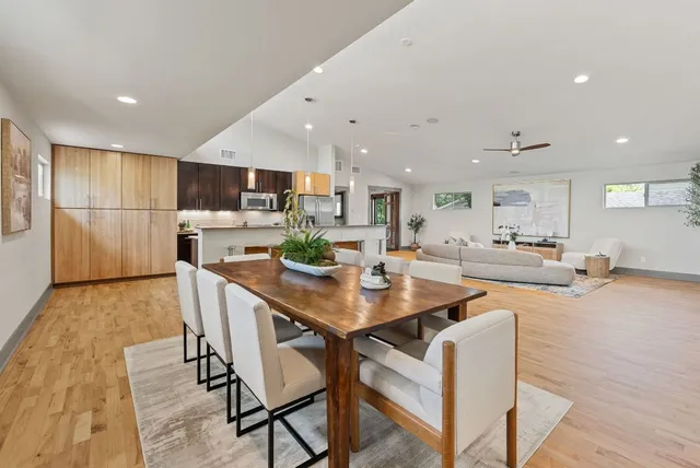 a view of a chairs and table in a patio