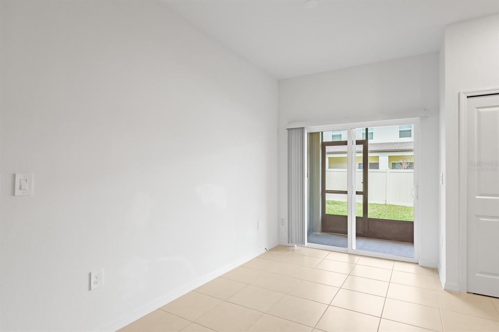 2642 Sunray Venus Way Ruskin, FL 33570 - Photo 11 of 30 a view of an empty room and window