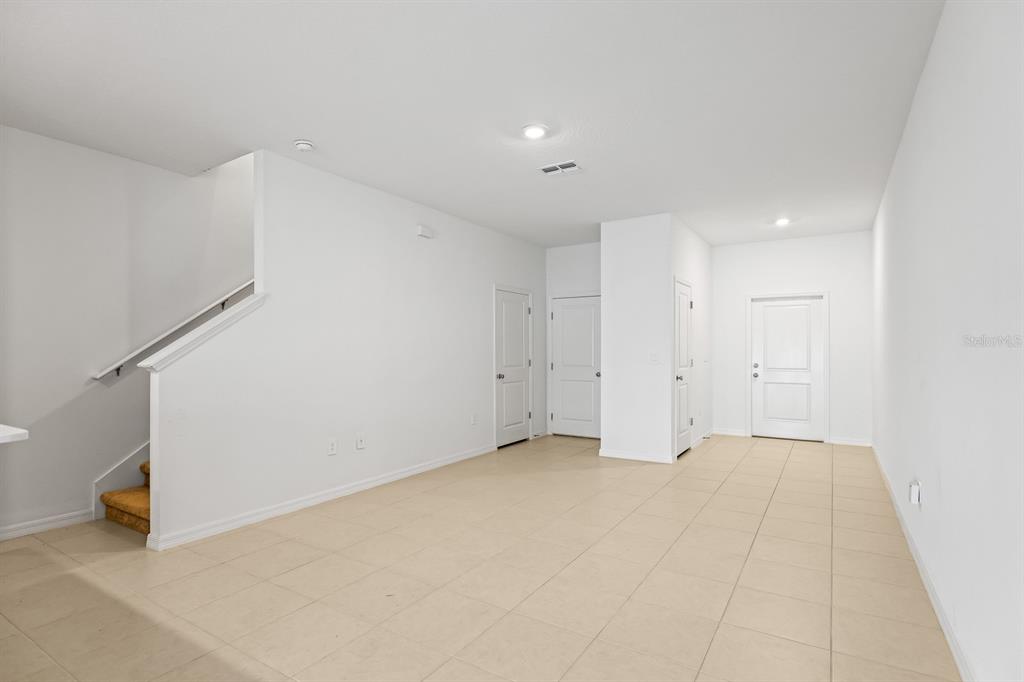 2642 Sunray Venus Way Ruskin, FL 33570 - Photo 13 of 30 a view of an empty room