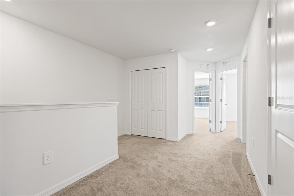 2642 Sunray Venus Way Ruskin, FL 33570 - Photo 14 of 30 a view of an empty room