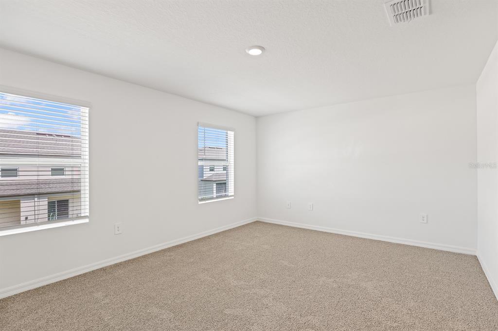 2642 Sunray Venus Way Ruskin, FL 33570 - Photo 15 of 30 an empty room with a window