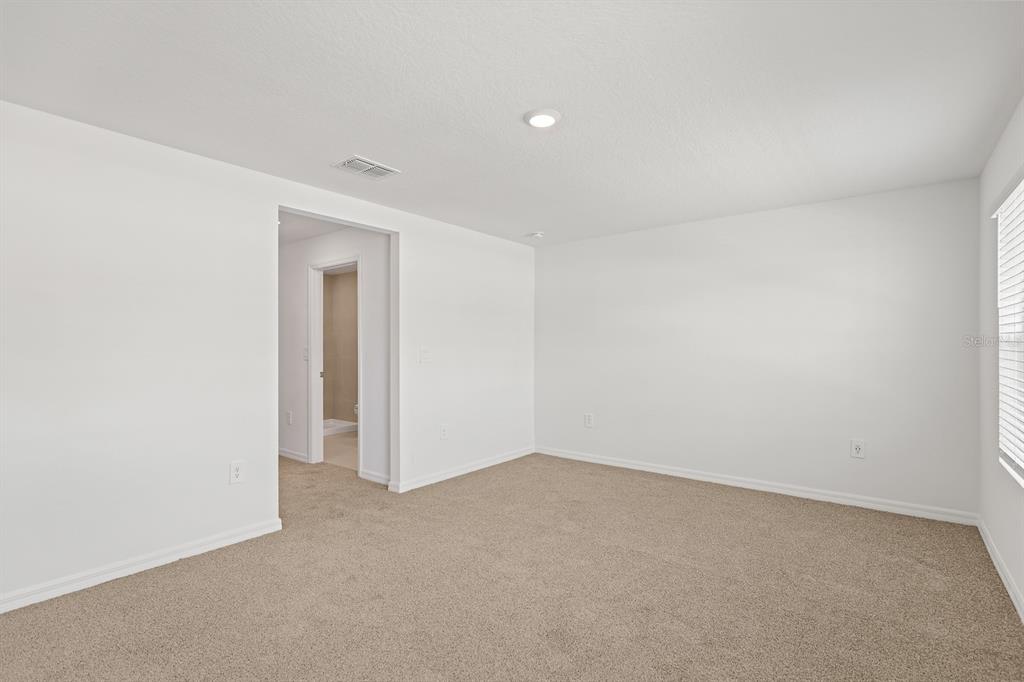 2642 Sunray Venus Way Ruskin, FL 33570 - Photo 17 of 30 a view of an empty room