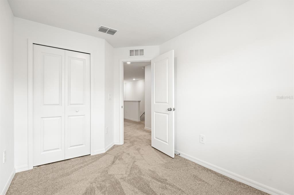 2642 Sunray Venus Way Ruskin, FL 33570 - Photo 22 of 30 a view of an empty room