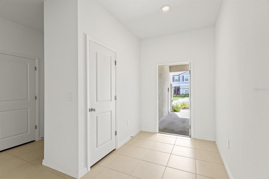2642 Sunray Venus Way Ruskin, FL 33570 - Photo 4 of 30 a view of an empty room with a bathroom