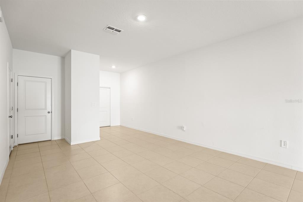 2642 Sunray Venus Way Ruskin, FL 33570 - Photo 6 of 30 a view of an empty room