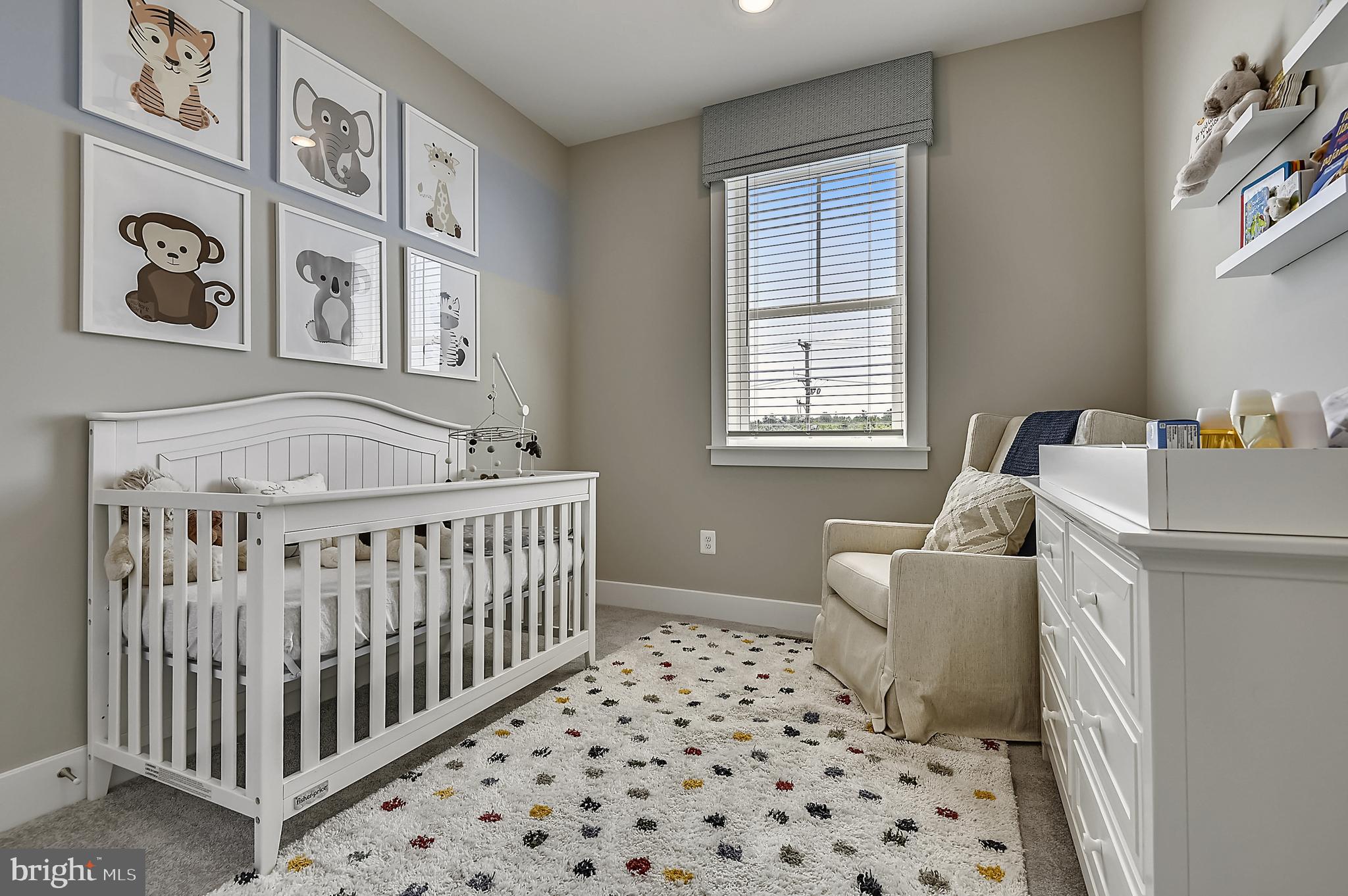 16601 Breezeway Alley Accokeek, MD 20607 - Photo 22 of 34 a bedroom with furniture and baby crib