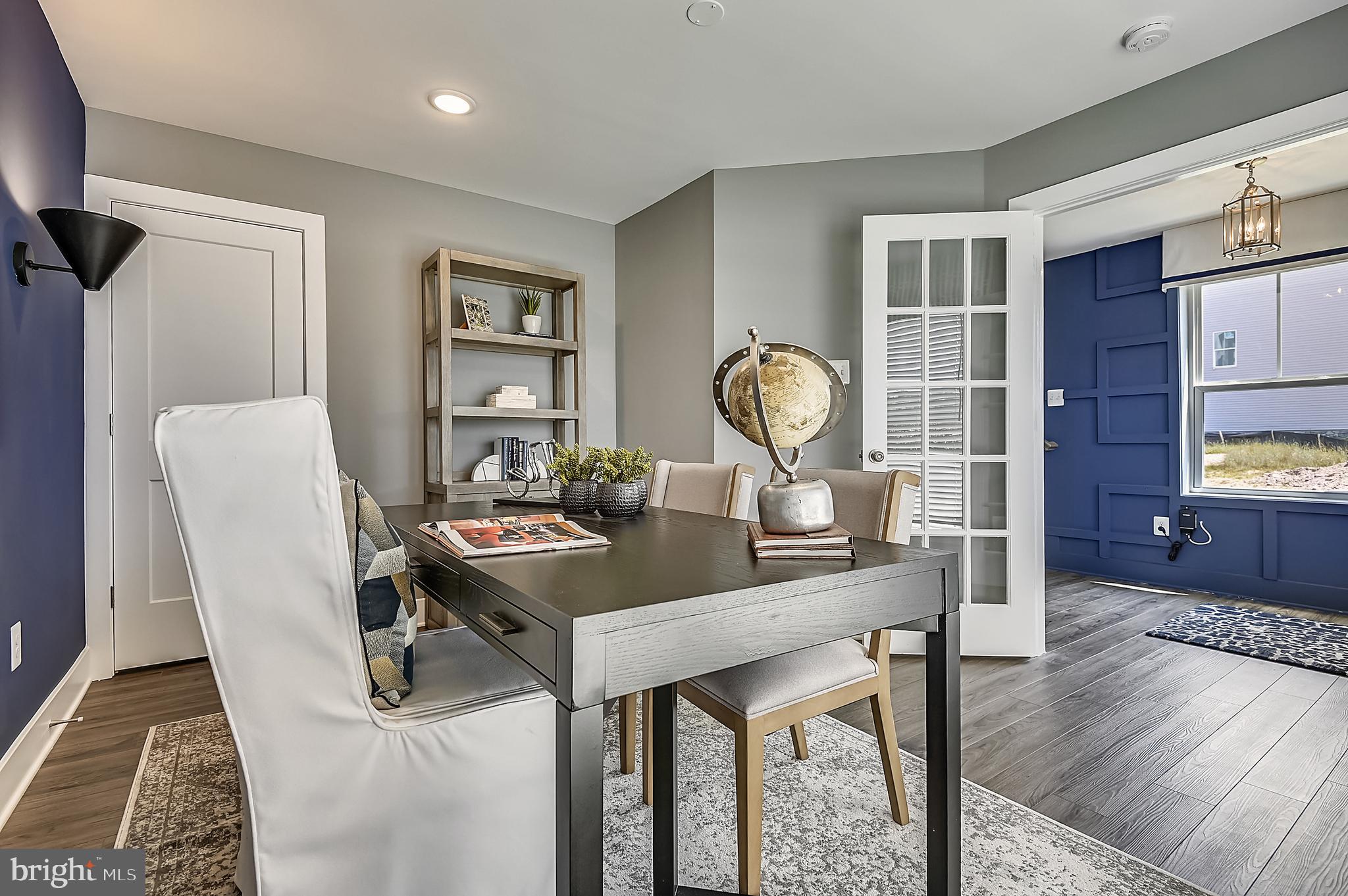 16601 Breezeway Alley Accokeek, MD 20607 - Photo 5 of 34 a view of a dining room with furniture window and wooden floor