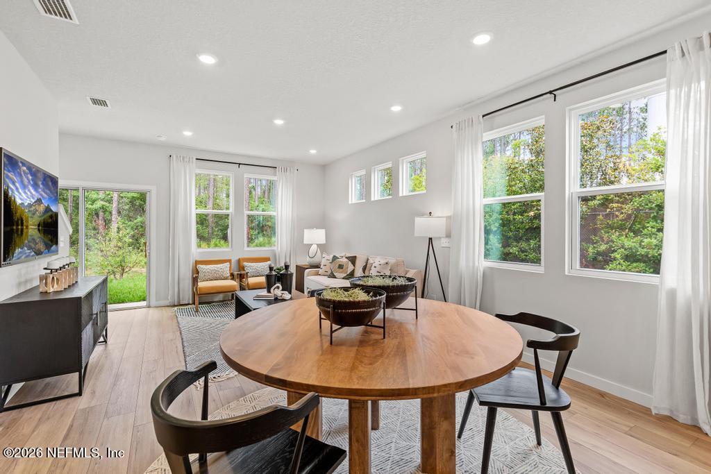 10698 Waterfield Road Jacksonville, FL 32210 - Photo 12 of 38 a view of a dining room with furniture window and outside view