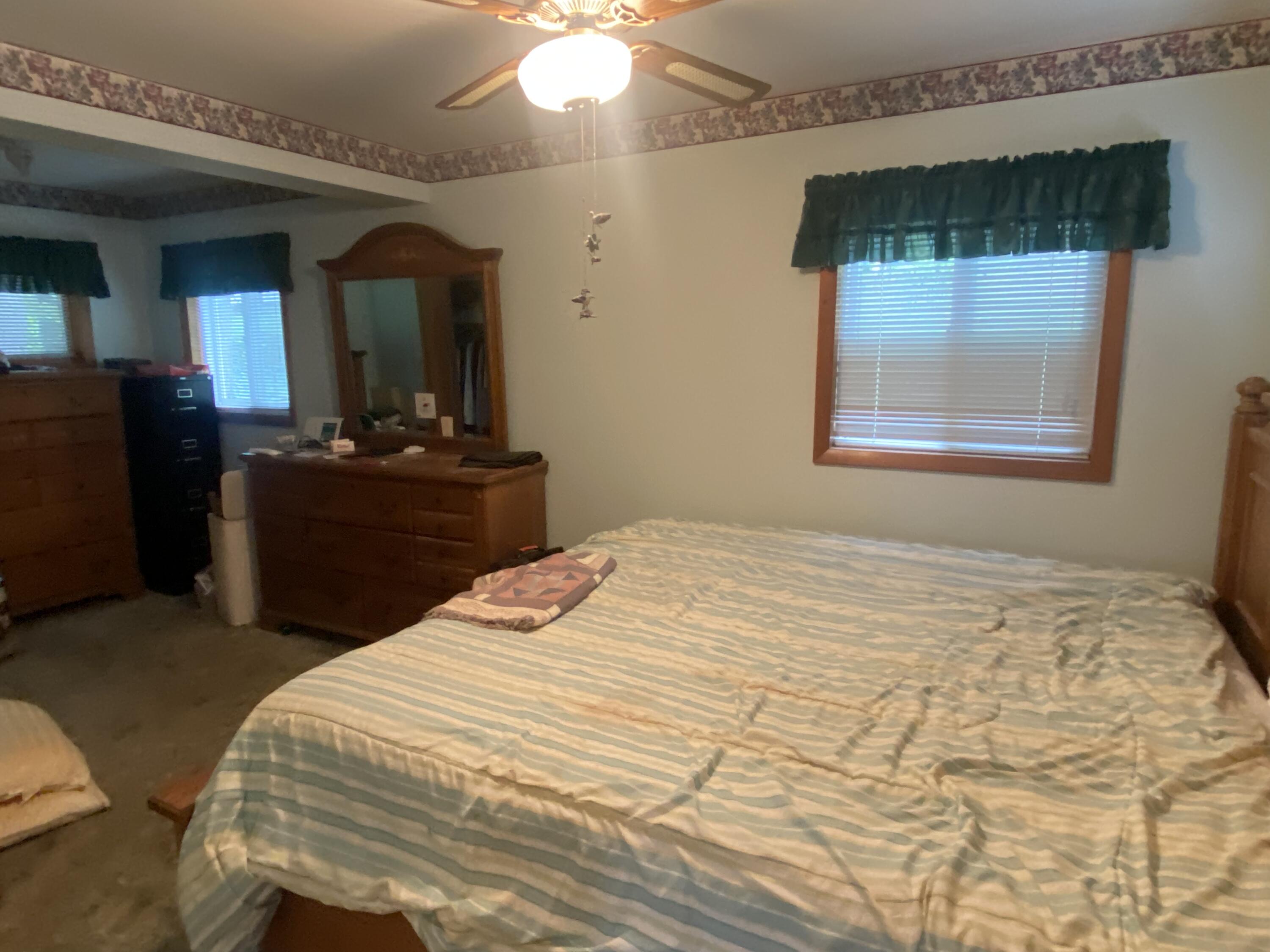 7 East Piney Road Manistee, MI 49660 - Photo 7 of 12 Main floor bedroom