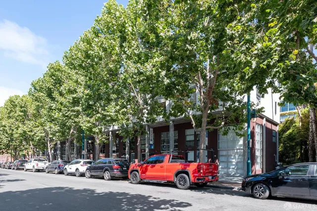 a view of a cars parked in front of a building
