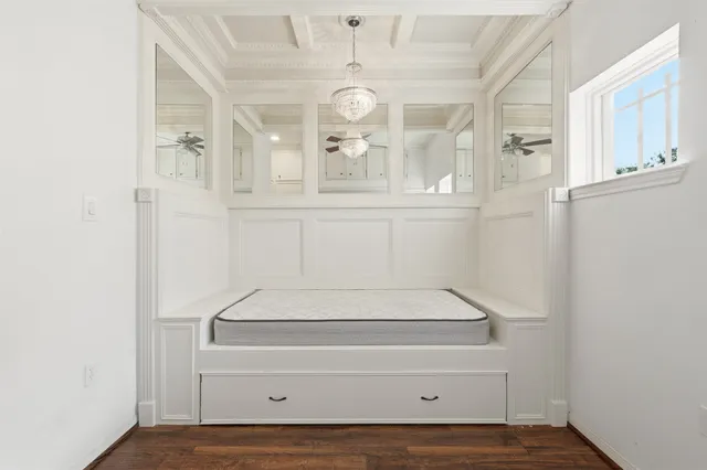 a view of an entryway with wooden floor