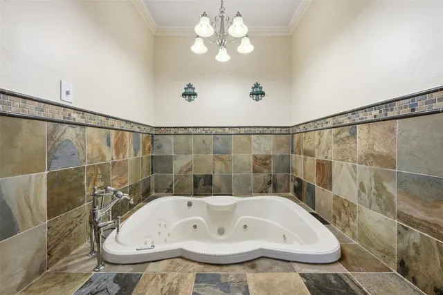 a bathroom with a granite countertop sink a mirror and a shower