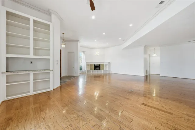 a view of a kitchen with a sink and a stove top oven
