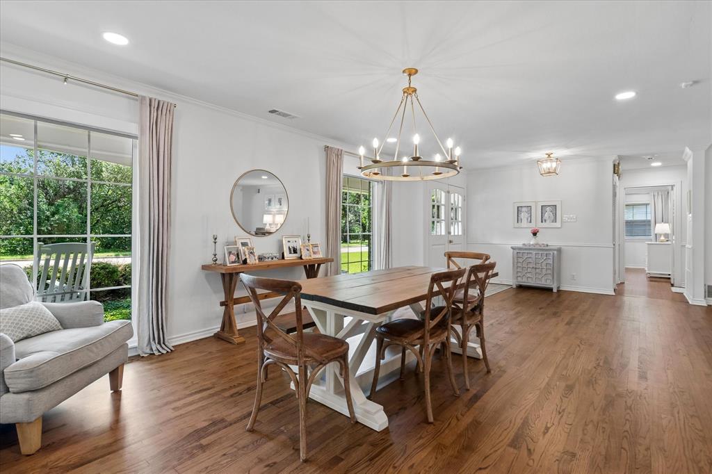 11439 Rosser Road Dallas, TX 75229 - Photo 6 of 35 a view of a dining room with furniture window and wooden floor