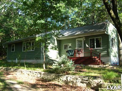 1619 Donalds Road Effort, PA 18330 - Photo 1 of 1 a front view of a house with a yard