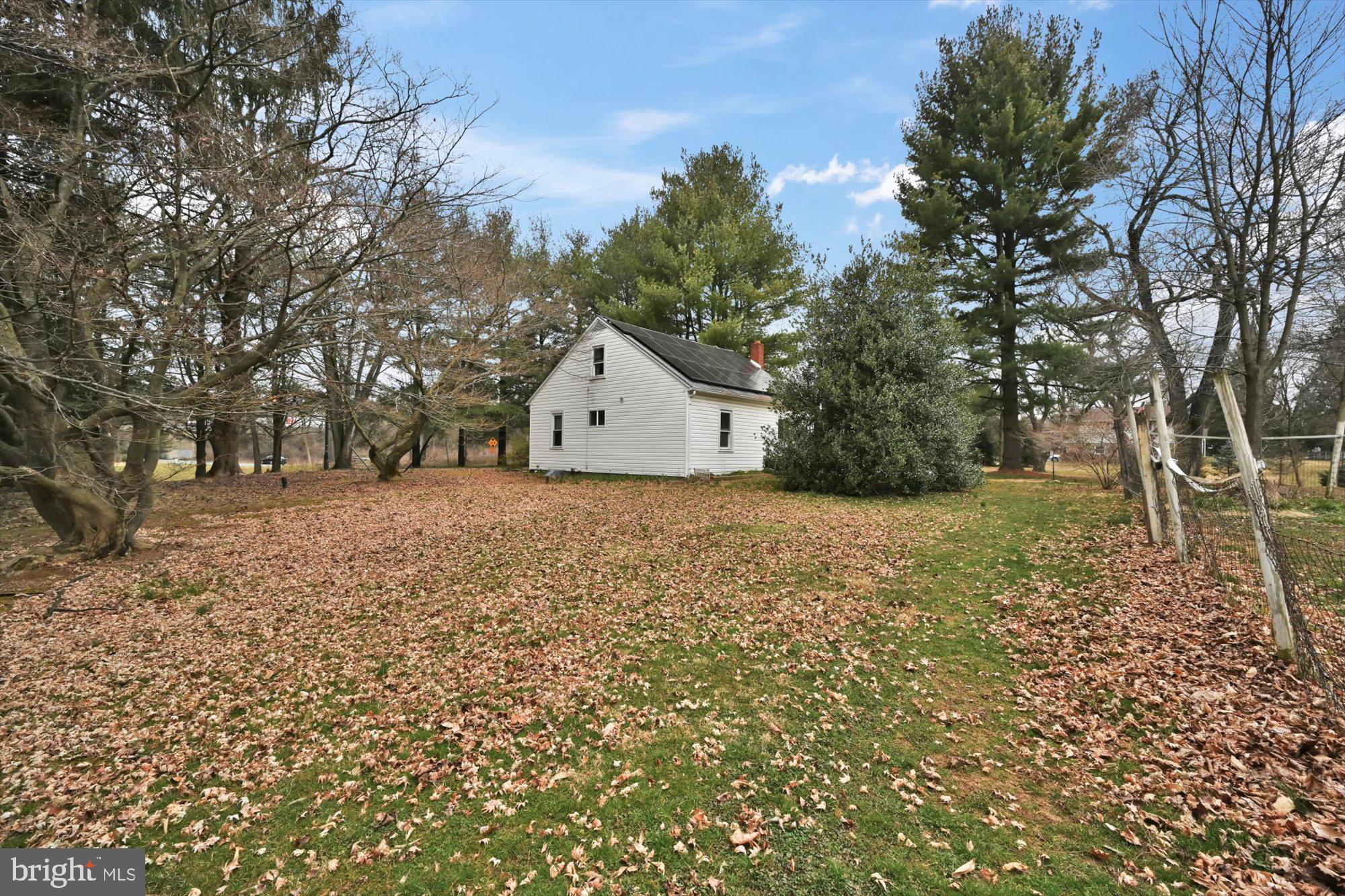 1130 Van Reed Road Reading, PA 19605 - Photo 33 of 39 a view of white house next to a large tree