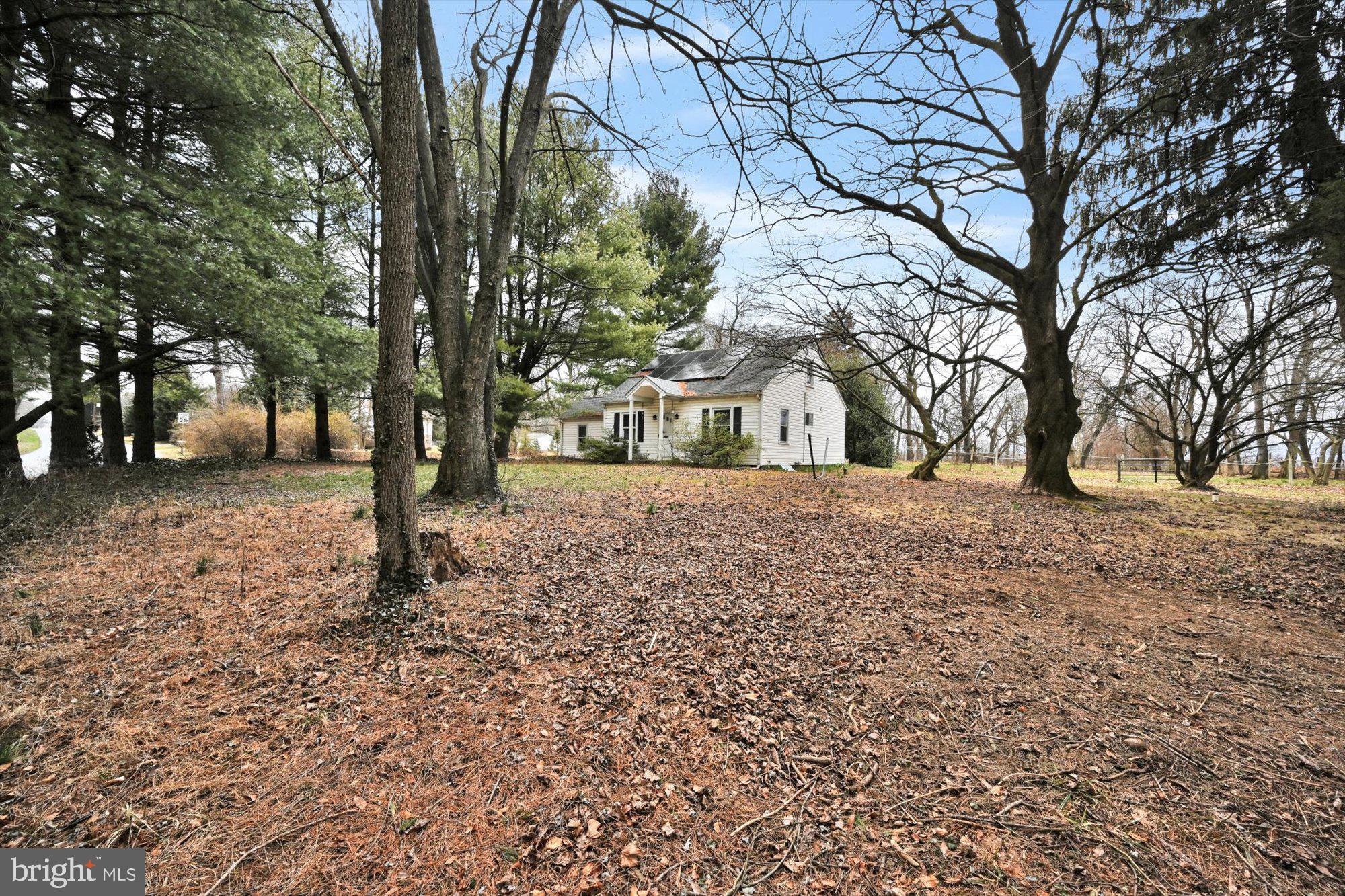 1130 Van Reed Road Reading, PA 19605 - Photo 7 of 39 a view of house with trees in the background