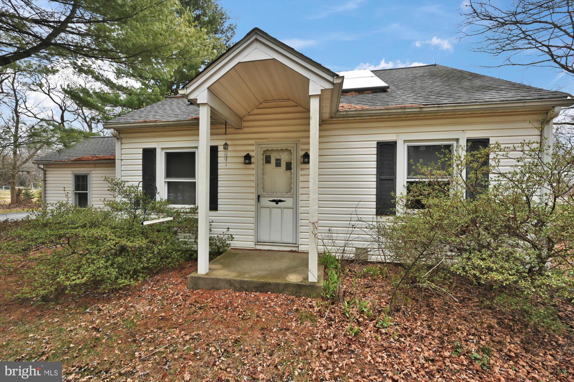 1130 Van Reed Road Reading, PA 19605 - Photo 8 of 39 front view of a house with a yard