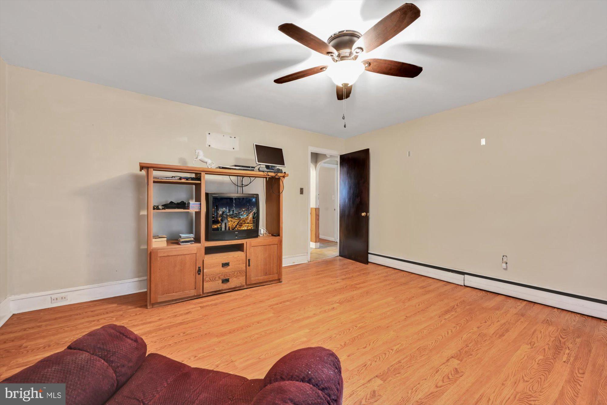 1130 Van Reed Road Reading, PA 19605 - Photo 10 of 39 a bedroom with a bed and a flat screen tv
