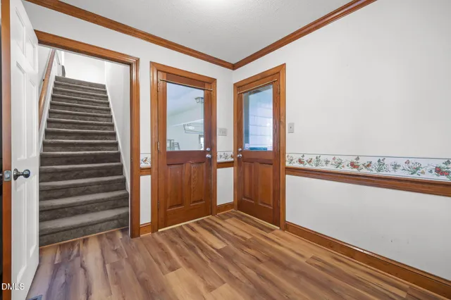 a view of a living room and a window
