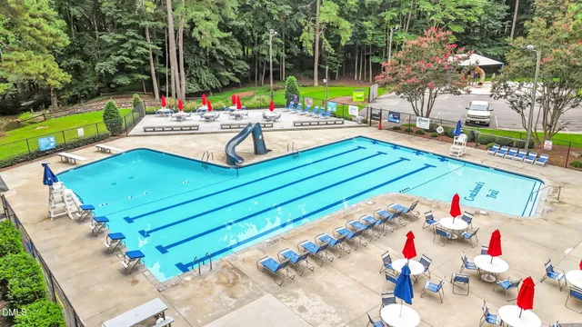 an outdoor space with lounge chair